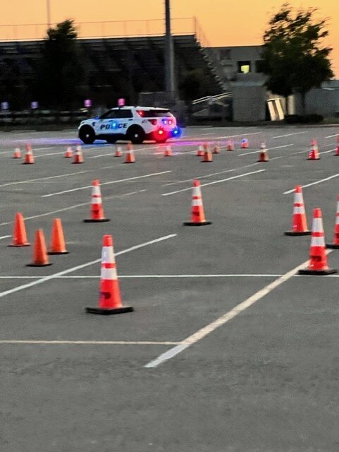 Could contain: outdoor, road, vehicle, car, cone, land vehicle, tarmac, asphalt, street, ground