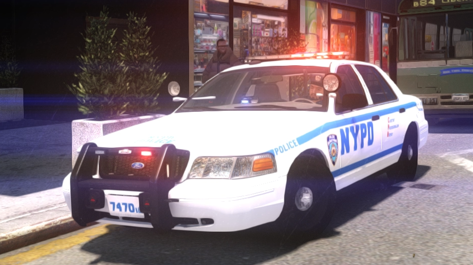 Could contain: vehicle, land vehicle, transport, wheel, text, police car, law enforcement, full-size car, outdoor, vehicle registration plate, ford crown victoria police interceptor, car, street, police