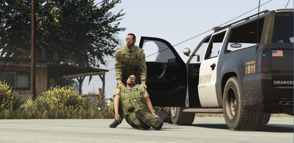 cop_drags_comrade.thumb.png.f39a2c623f98