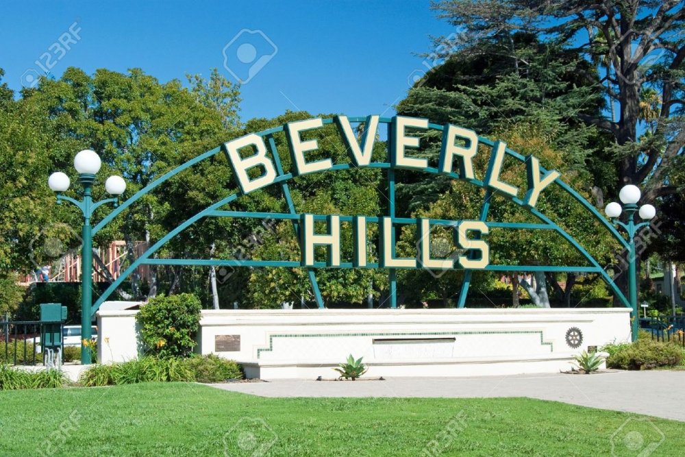 18386400-Beverly-Hills-sign-in-Los-Angeles-park-with-beautiful-blue-sky-in-background-Stock-Photo.jpg