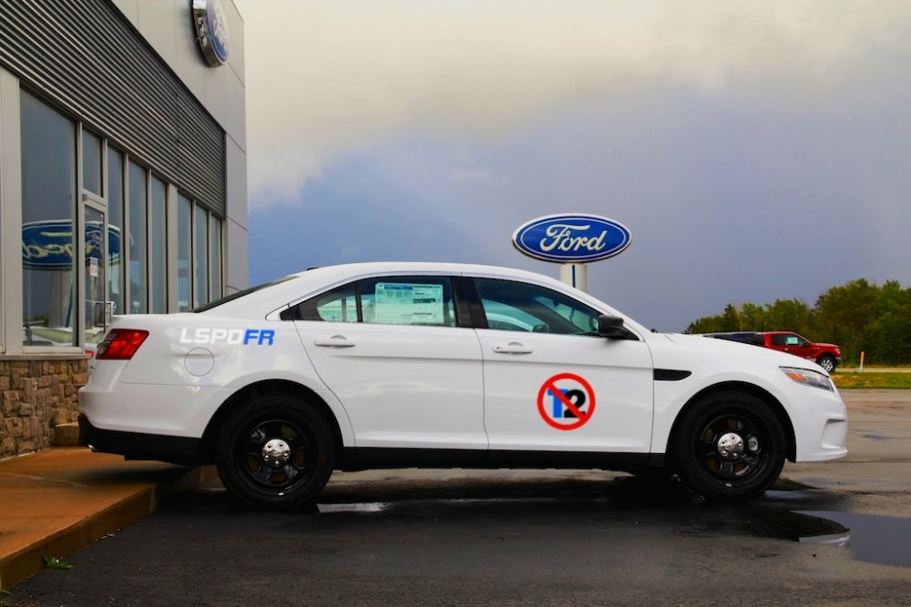 2014-ford-taurus-police-interceptor-white-side.jpg2.thumb.jpg.09d7a35c810c9764b577c5240d7cda6a.jpg