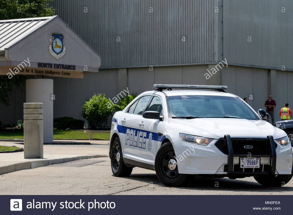 a-security-forces-vehicle-blocks-a-road-outside-the-north-entrance-of-the-national-air-and-space-intelligence-center-during-an-active-shooter-exercise-at-wright-patterson-air-force-ba.jpg