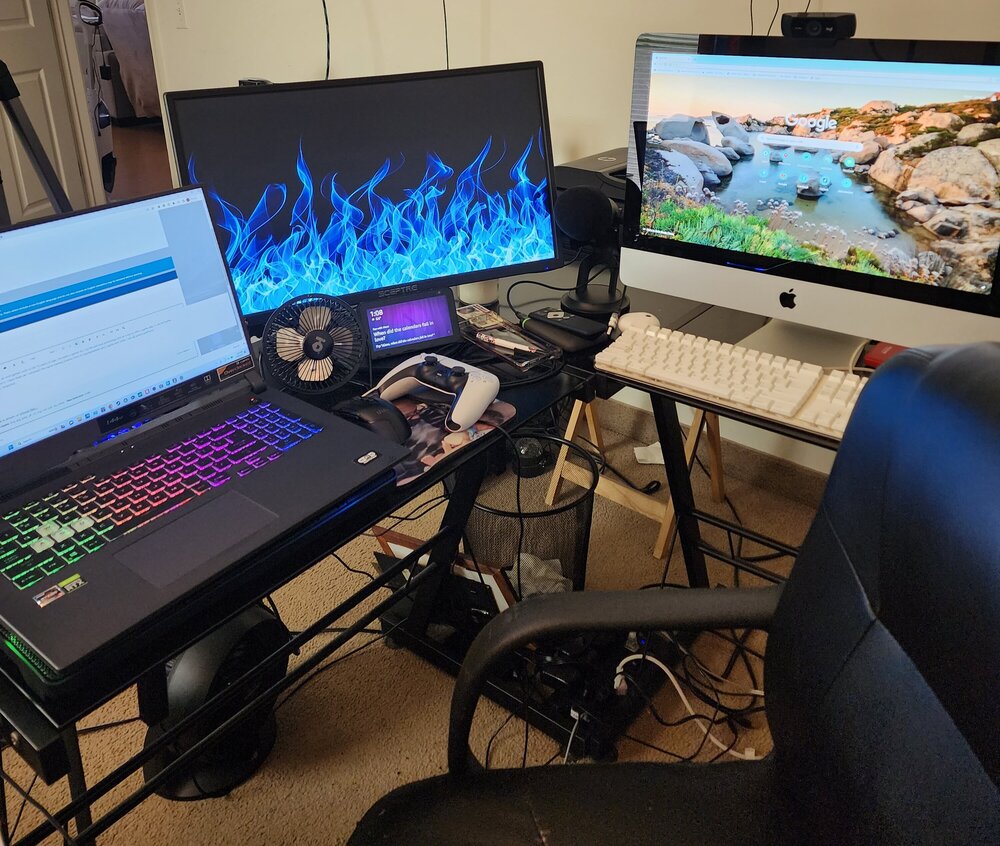 Could contain: text, indoor, furniture, computer monitor, computer, personal computer, electronics, output device, computer hardware, electronic device, desk, desktop computer, display device, flat panel display, computer keyboard, computer desk, led-backlit lcd display, table, broadcasting, personal computer hardware, input device, wall, peripheral, computer terminal, floor