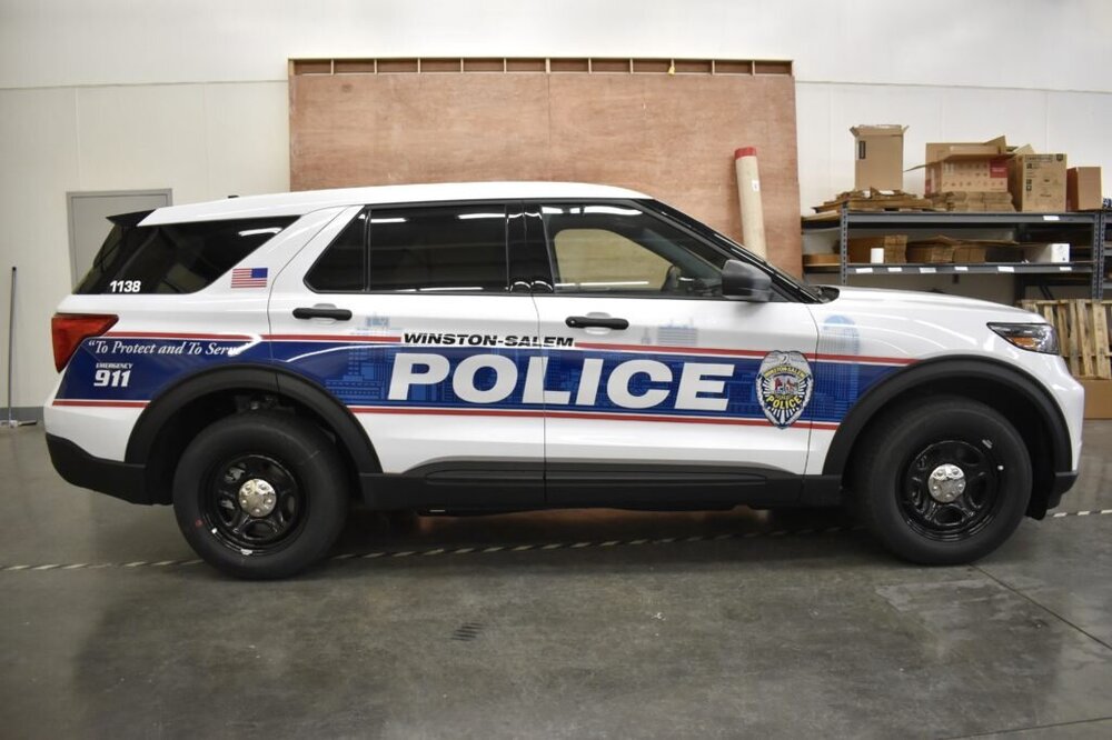 Could contain: vehicle, land vehicle, wheel, tire, transport, text, car, bumper, auto part, sport utility vehicle, automotive exterior, ford, automotive tire, police car, compact sport utility vehicle, motor vehicle, law enforcement, fender, roof rack, crossover suv, automotive luggage rack, outdoor, suv, parked, police