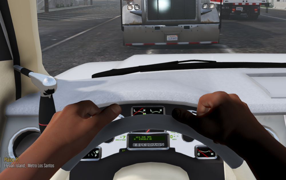 Could contain: text, vehicle, car, person, land vehicle, mirror, auto part, windshield, outdoor, control