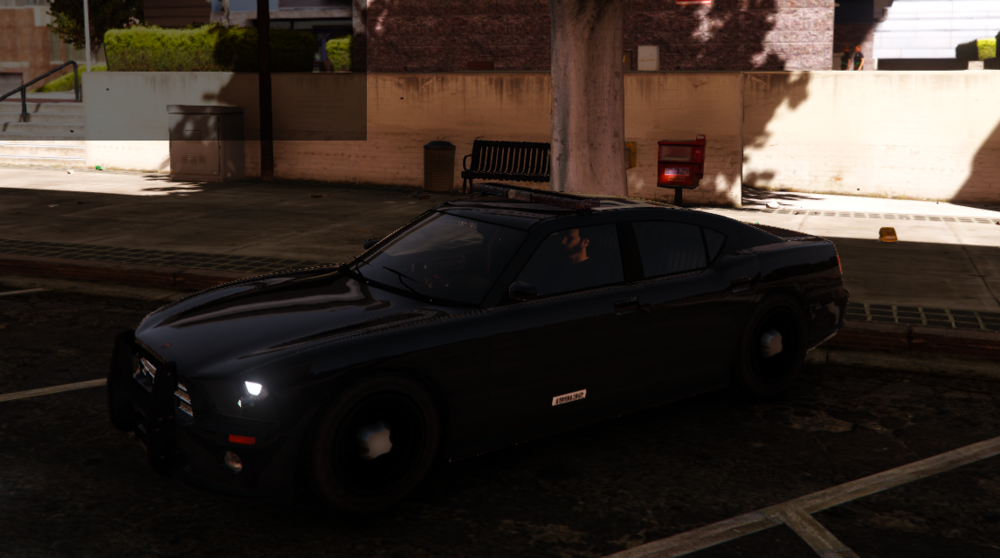 Could contain: wheel, vehicle, land vehicle, outdoor, transport, tire, building, ground, car, road, parked