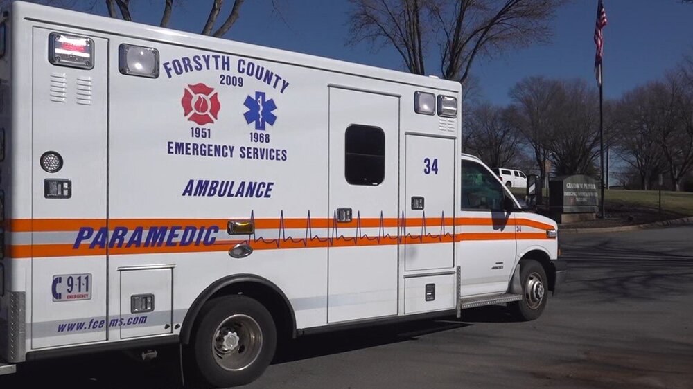 Could contain: transport, text, vehicle, land vehicle, wheel, outdoor, emergency vehicle, emergency service, emergency, mode of transport, van, light commercial vehicle, service, road, truck, ambulance, parked, street