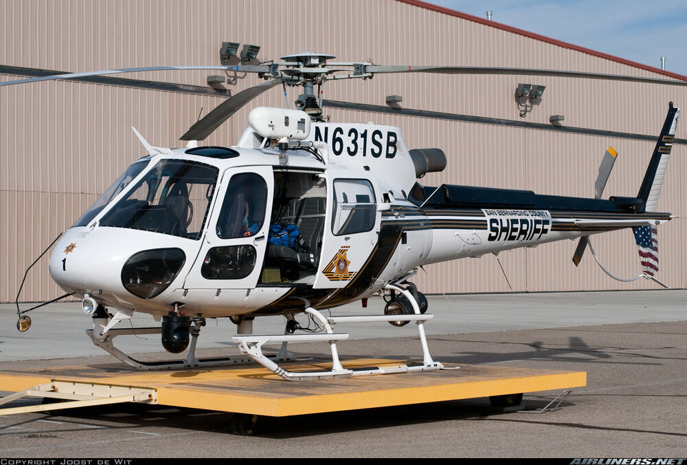 Could contain: transport, aircraft, helicopter, helicopter rotor, vehicle, rotorcraft, outdoor, military helicopter, aviation, plane, ground, chopper