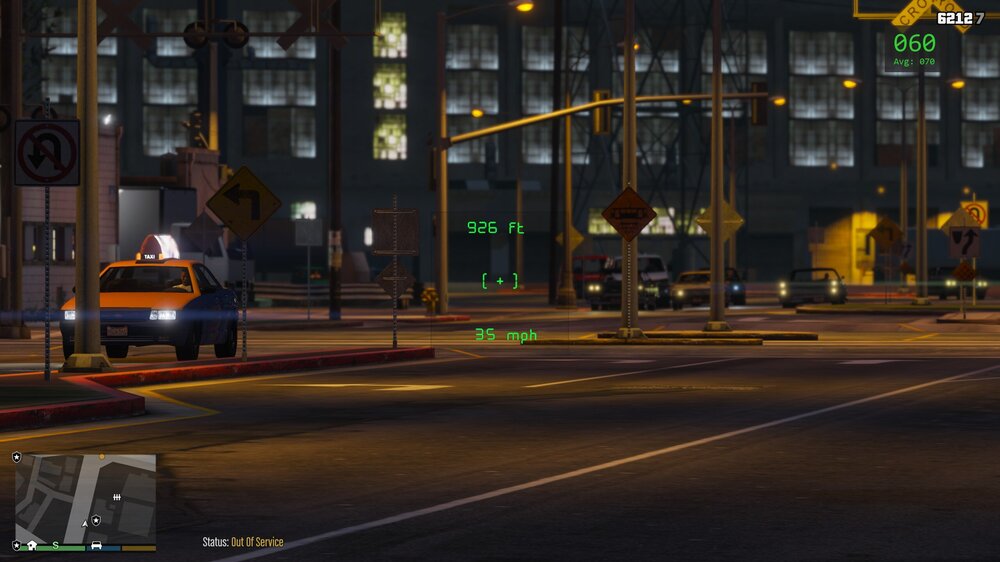 Could contain: building, land vehicle, vehicle, road, outdoor, car, street, light, night, street light, signaling device, electricity, city, traffic light, traffic