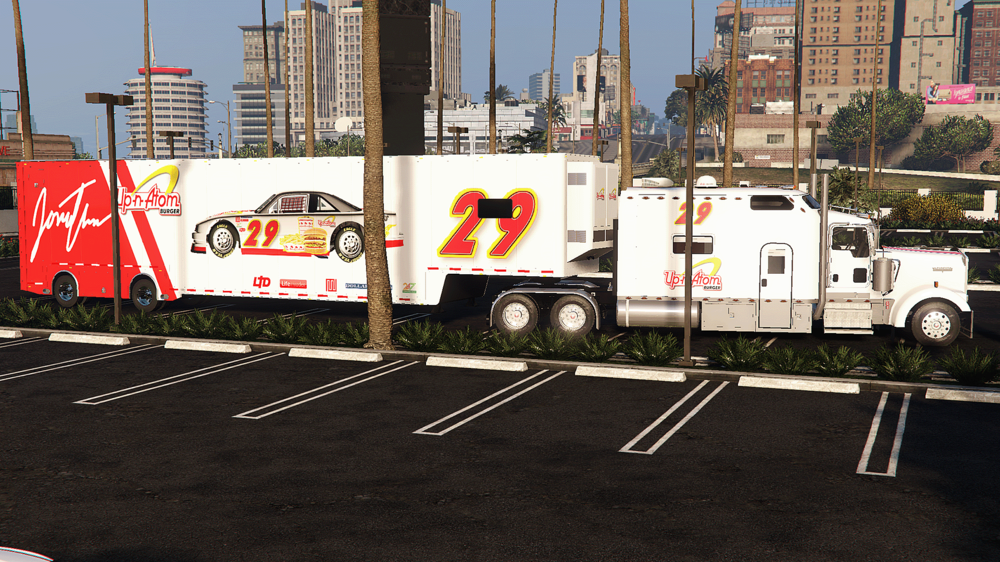 Could contain: vehicle, land vehicle, outdoor, sky, wheel, building, city, truck