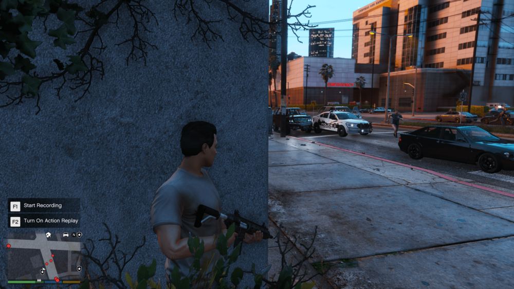 Could contain: outdoor, car, land vehicle, building, vehicle, tree, man, wheel, street, person, city