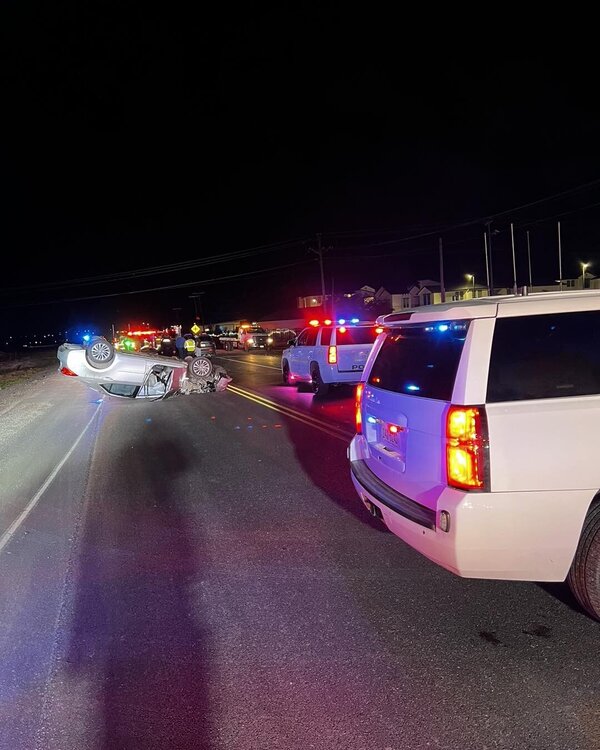 Could contain: vehicle, land vehicle, outdoor, wheel, text, vehicle registration plate, road, automotive tail & brake light, tire, automotive exterior, automotive lighting, auto part, family car, sport utility vehicle, motor vehicle, night, car, light, street, parked, ground, parking