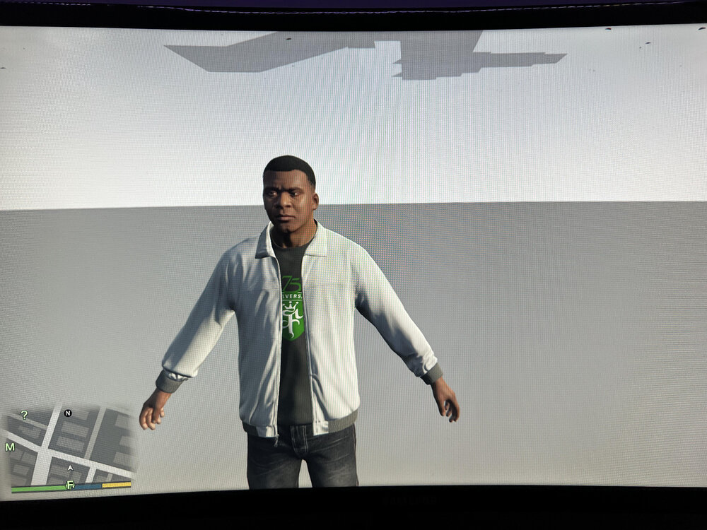 Could contain: clothing, person, man, monitor, display device, standing