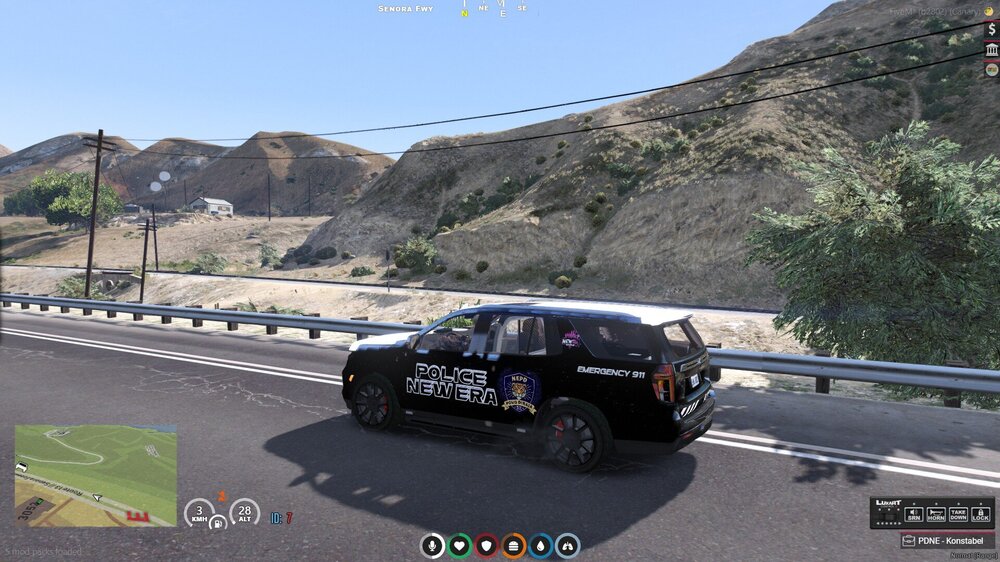 Could contain: vehicle, text, land vehicle, outdoor, wheel, tire, sky, road, motorsport, auto part, mountain, racing, car