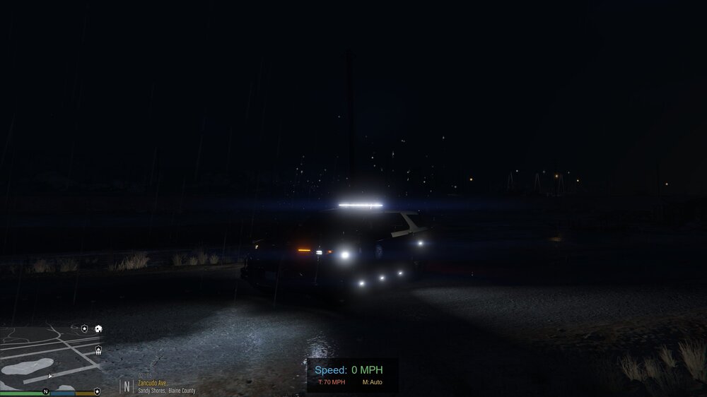 Could contain: vehicle, outdoor, car, sky, night, road, darkness, land vehicle, ground, light