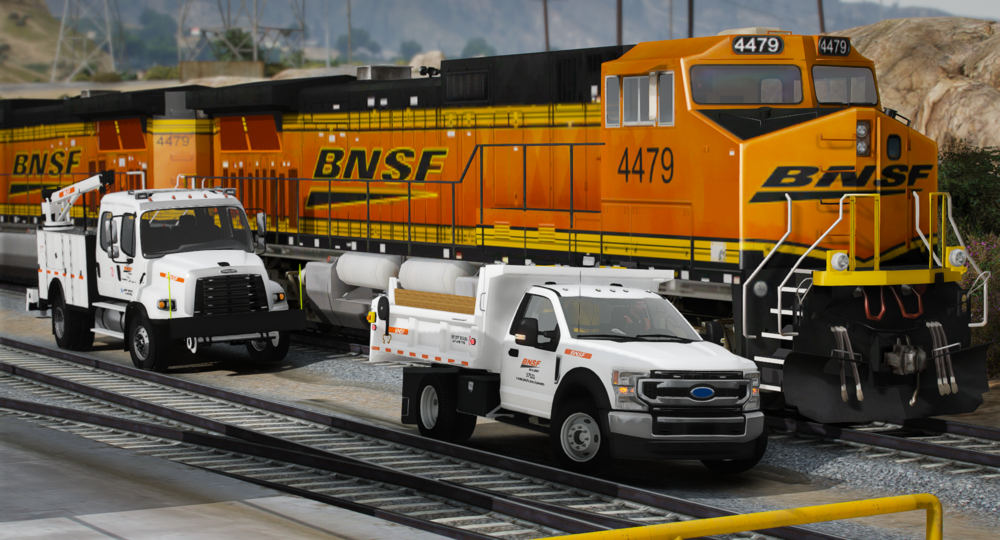 Could contain: vehicle, land vehicle, wheel, outdoor, transport, auto part, text, commercial vehicle, road, freight transport, rolling, mode of transport, yellow, track, truck, construction, railroad, parked