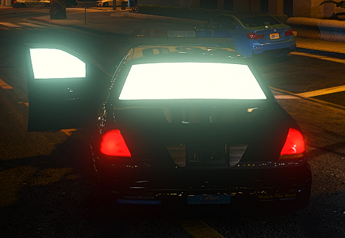 Could contain: vehicle, land vehicle, automotive lighting, automotive tail & brake light, wheel, text, vehicle registration plate, outdoor, automotive exterior, automotive design, luxury vehicle, auto part, automotive side marker light, automotive parking light, tire, road, car, light, ground, night, street, red