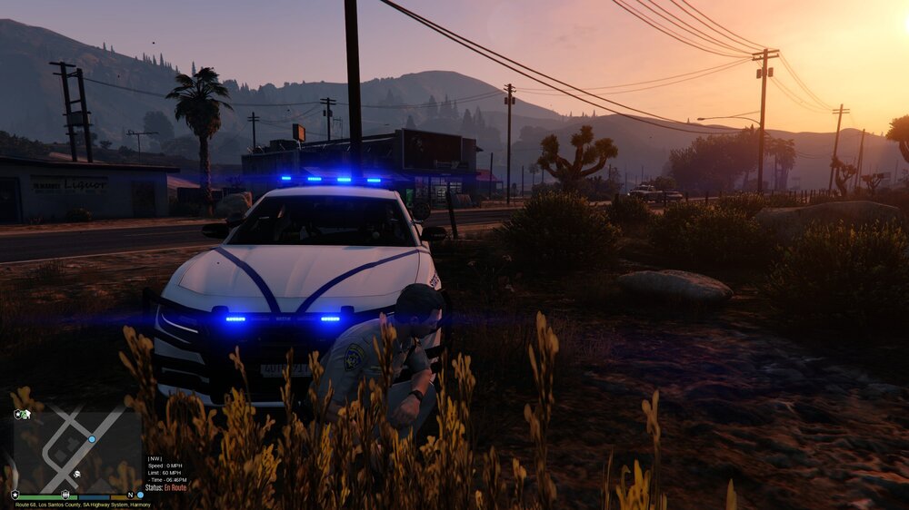 Could contain: land vehicle, vehicle, outdoor, sky, transport, wheel, tire, car, grass, mountain, sunset