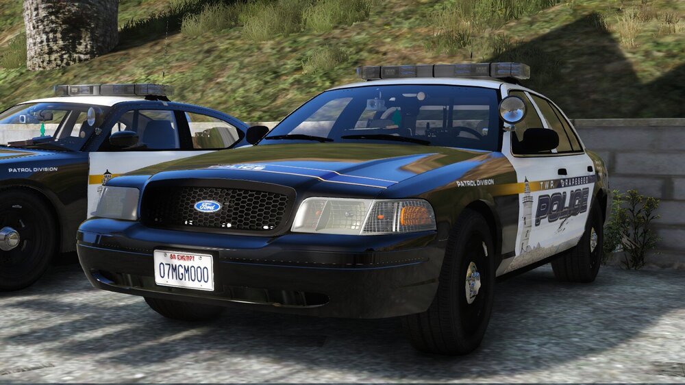 Could contain: vehicle, land vehicle, outdoor, wheel, tire, transport, text, bumper, car, auto part, automotive exterior, vehicle registration plate, police, ford, automotive tire, full-size car, police car, hardtop, grille, automotive light bulb, law enforcement, hood, fender, motor vehicle, ground, parked