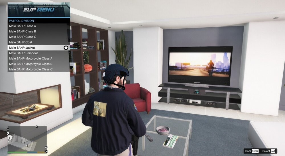 Could contain: text, clothing, indoor, wall, person, furniture, television, pc game, television set, entertainment center