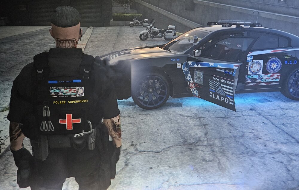 Could contain: tire, clothing, wheel, vehicle, person, ground, auto part, land vehicle, man, car, automotive tire