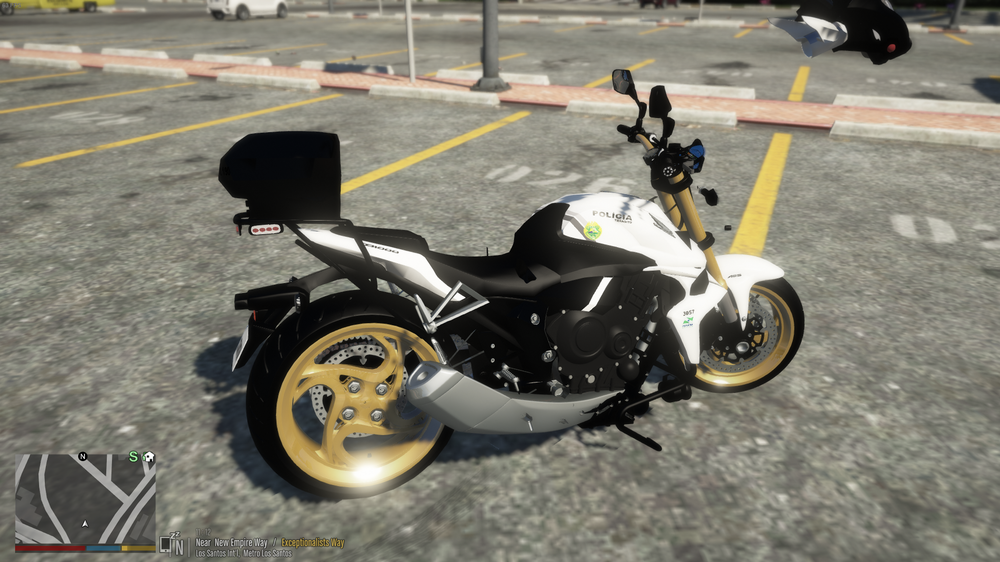 Could contain: motorcycle, tire, vehicle, wheel, land vehicle, outdoor, road, auto part, ground, motorbike, vehicle brake, brake, fuel tank, motorcycle fairing, automotive tire, disc brake, cruiser, bike, motorcycling, parked, street