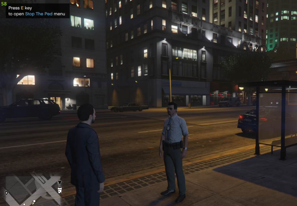 Could contain: clothing, building, person, man, outdoor, city, skyscraper, screenshot, street, night