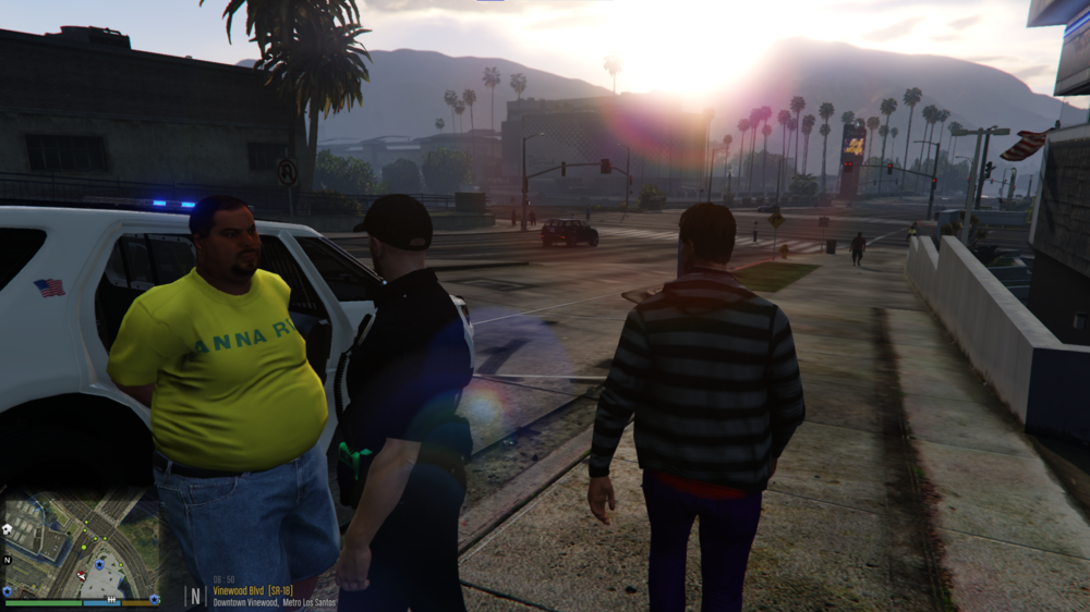 Could contain: clothing, outdoor, person, sky, land vehicle, vehicle, tree, man, car, ground, standing, people