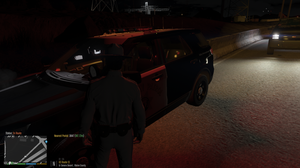 Could contain: vehicle, land vehicle, clothing, wheel, screenshot, pc game, person, car, outdoor, night