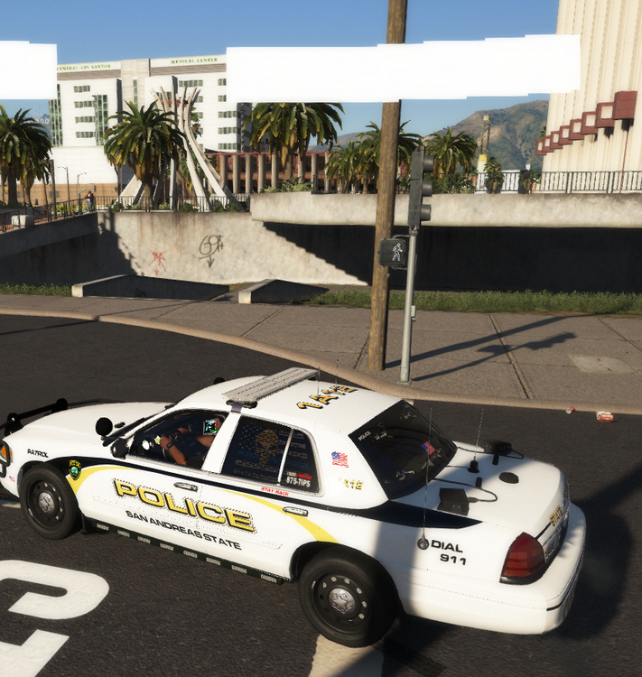 Could contain: vehicle, land vehicle, outdoor, transport, wheel, car, sky, full-size car, road, police car, law enforcement, ford crown victoria police interceptor, sedan, police, street
