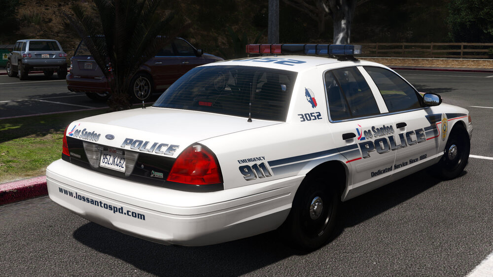 Could contain: vehicle, land vehicle, text, wheel, outdoor, transport, full-size car, vehicle registration plate, law enforcement, police car, police, sedan, ford crown victoria police interceptor, car