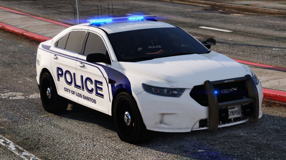 Could contain: vehicle, land vehicle, wheel, police car, text, police, law enforcement, outdoor, full-size car, car, holden ve commodore, automotive light bulb, ford, road