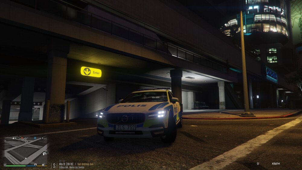 Could contain: vehicle, land vehicle, building, wheel, outdoor, screenshot, text, road, car, tire, night, street, ground, light