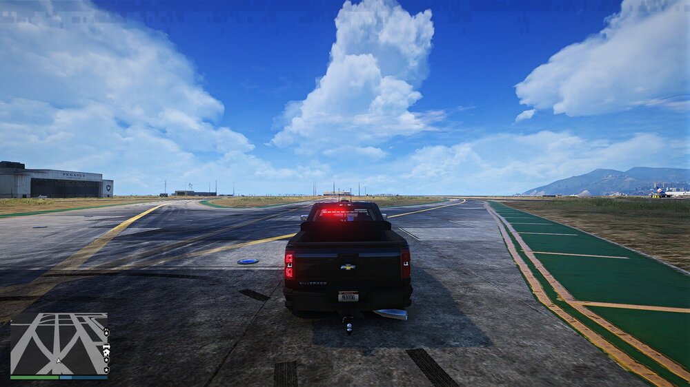 Could contain: outdoor, sky, cloud, vehicle, land vehicle, road, ground, wheel, car, tarmac, road surface, asphalt, way, grass, highway, red