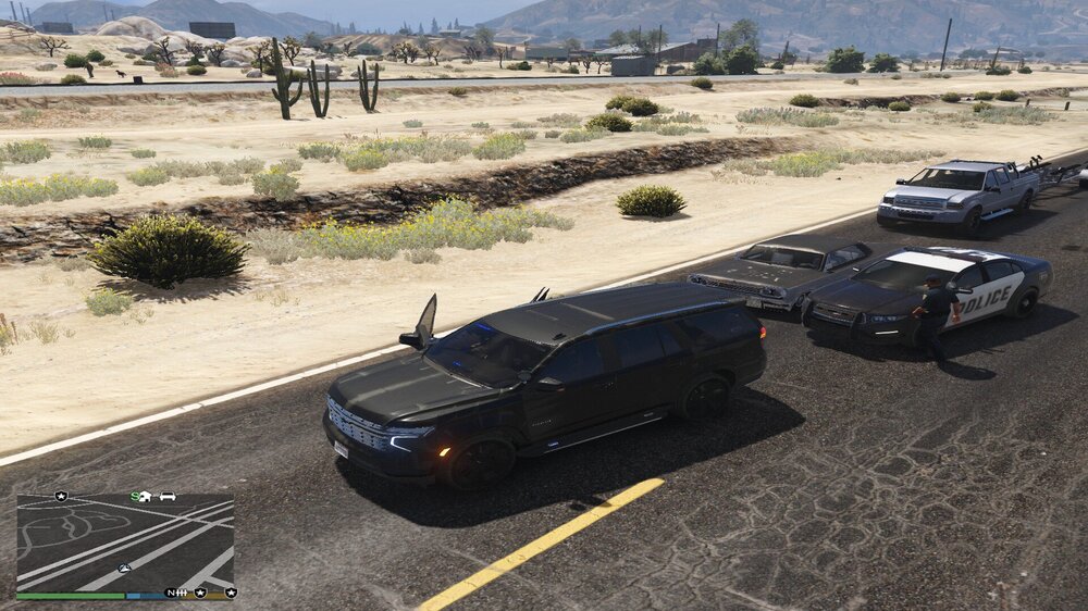 Could contain: outdoor, vehicle, land vehicle, wheel, ground, tire, road, transport, car, mountain, parked, parking, military vehicle