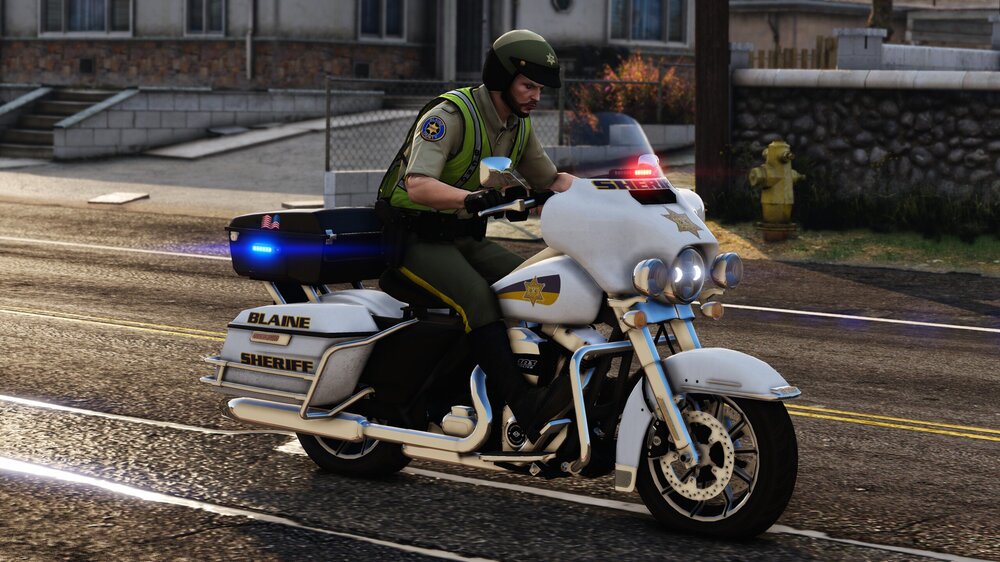 Could contain: outdoor, motorcycle, vehicle, land vehicle, wheel, road, motorbike, clothing, person, tire, motorcycle helmet, motorcycle fairing, auto part, man, riding, building, fuel tank, cruiser, street, motorcycling, ground, helmet, police