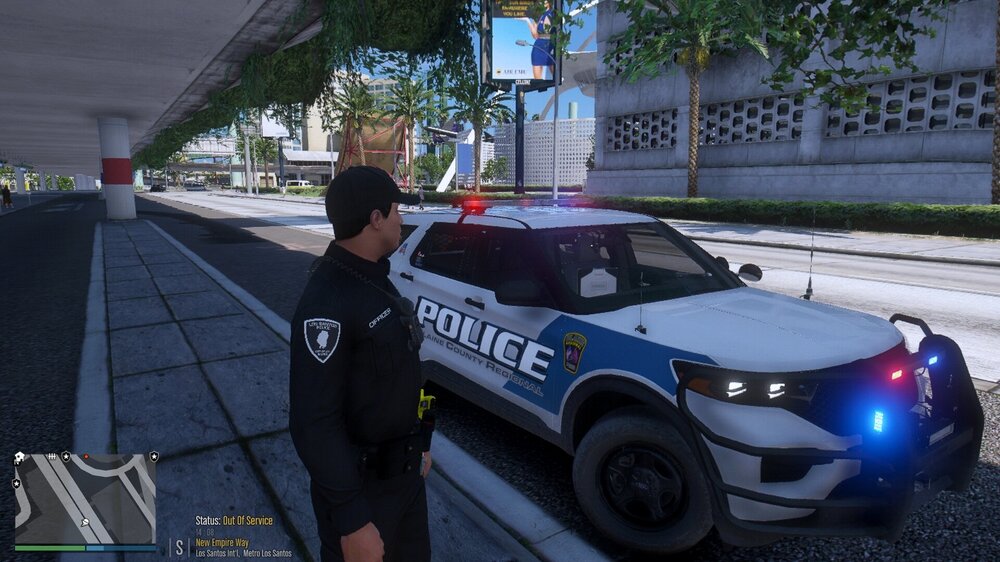 Could contain: land vehicle, vehicle, wheel, outdoor, text, tire, clothing, car, law enforcement, transport, police car, person, road, auto part, police, vehicle registration plate, officer, street