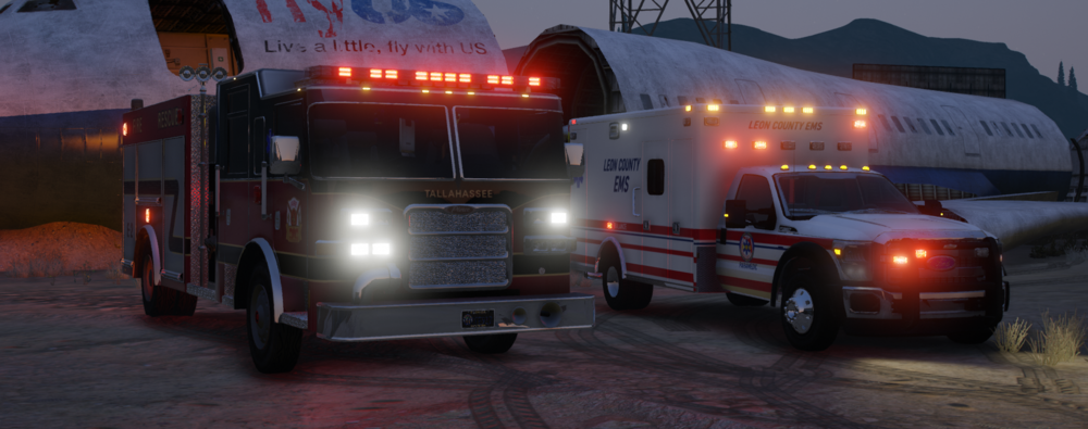 Could contain: transport, vehicle, land vehicle, wheel, outdoor, truck, firefighter, emergency service, mode of transport, plane, light, parked, fire