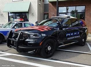 Could contain: vehicle, land vehicle, wheel, text, transport, car, tire, automotive exterior, outdoor, bumper, auto part, motor vehicle, automotive design, full-size car, personal luxury car, law enforcement, mid-size car, vehicle registration plate, road, police, street