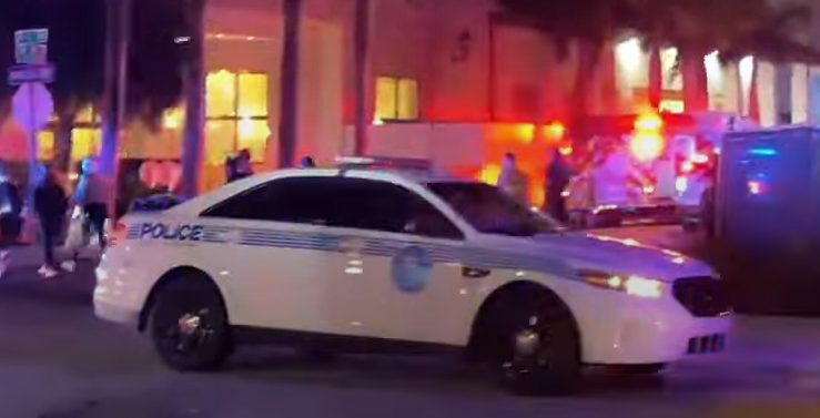 Could contain: vehicle, land vehicle, transport, wheel, car, outdoor, full-size car, mid-size car, police car, law enforcement, sedan, tire, street, road, police, night, light