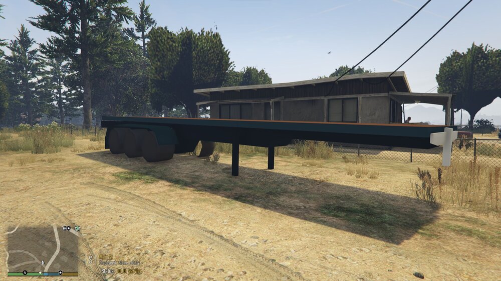 Could contain: outdoor, sky, grass, tree, plant, ground, land lot, building, house, field, bridge, track