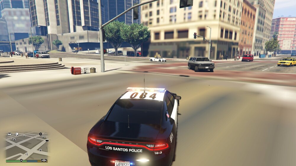 Could contain: vehicle, land vehicle, outdoor, road, wheel, building, traffic, text, street, city, car
