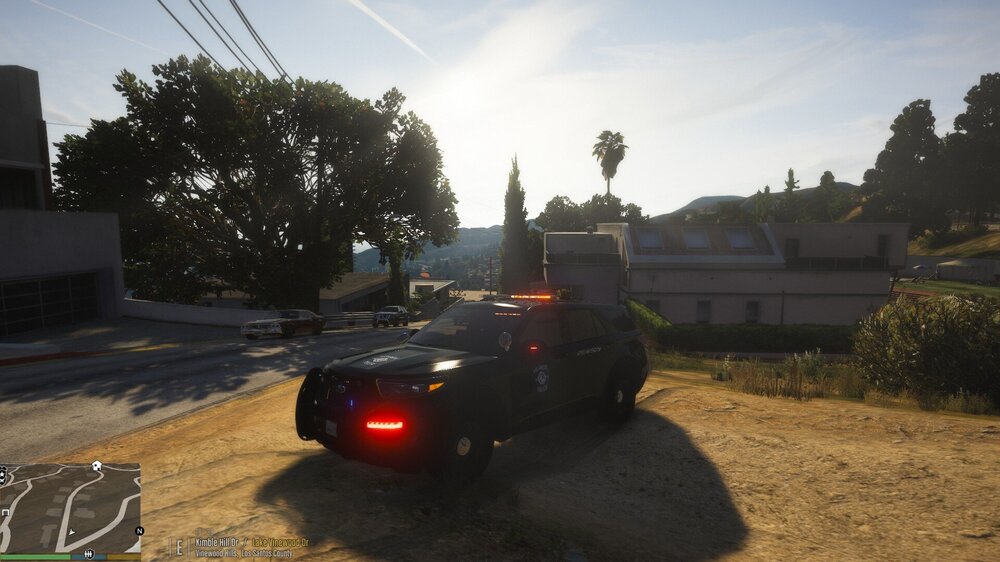 Could contain: outdoor, sky, land vehicle, vehicle, tree, wheel, car, tire, cloud, road, ground, street, light