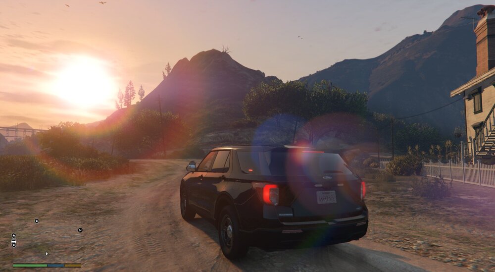 Could contain: outdoor, land vehicle, vehicle, sky, sunset, wheel, car, mountain, road, tire, ground, street, sun, sunrise