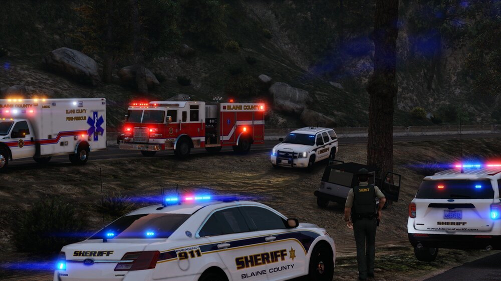 Could contain: vehicle, land vehicle, outdoor, wheel, transport, emergency service, emergency vehicle, car, emergency, police car, law enforcement, firefighter, text, police, fire, light, ambulance