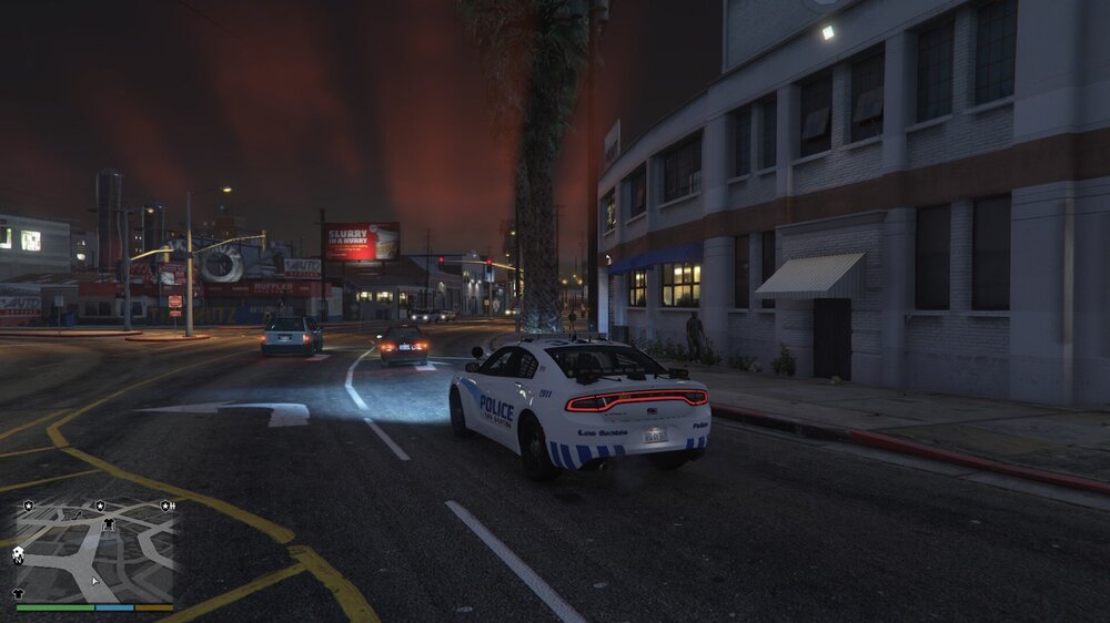 Could contain: vehicle, land vehicle, outdoor, road, wheel, building, street, car, way, light, night