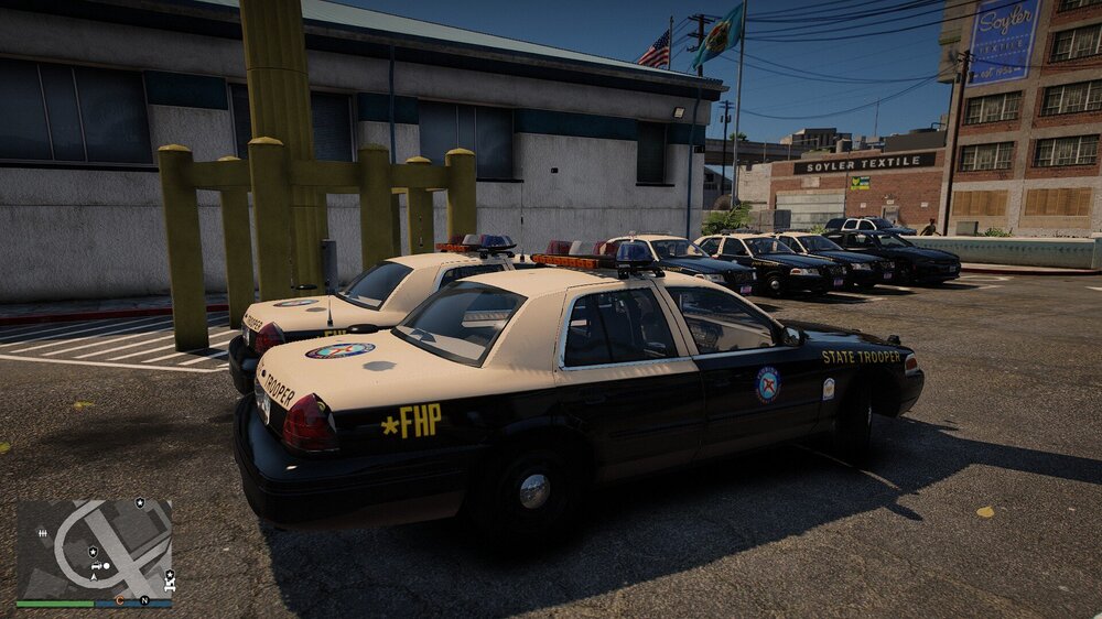 Could contain: vehicle, land vehicle, wheel, outdoor, building, tire, transport, text, auto part, ground, car, parked