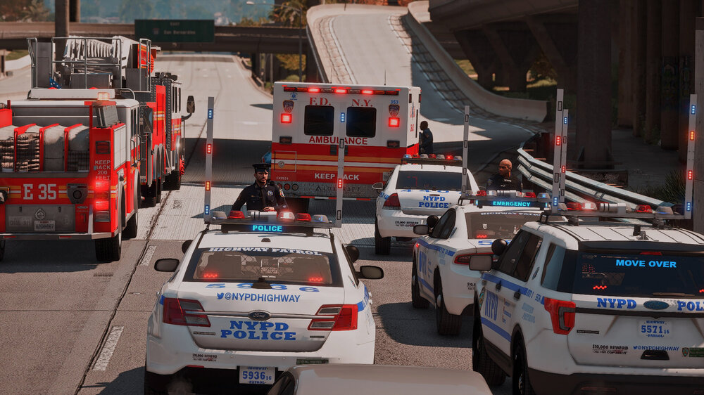 Could contain: vehicle, land vehicle, outdoor, emergency service, wheel, emergency vehicle, transport, text, emergency, car, fire department, vehicle registration plate, firefighter, fire apparatus, mode of transport, service, truck, road, fire, police, street