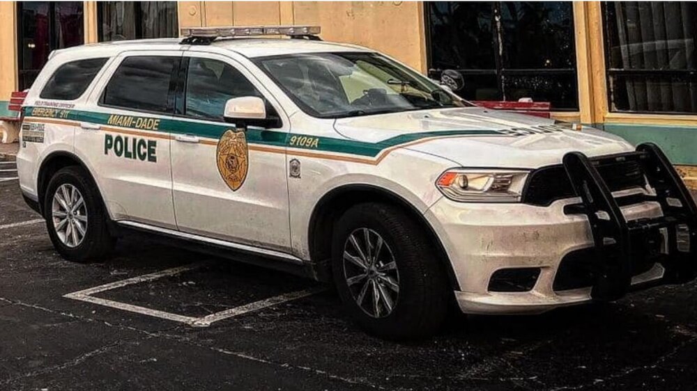 Could contain: vehicle, land vehicle, wheel, tire, text, transport, law enforcement, police car, bumper, auto part, car, sport utility vehicle, police, ford, vehicle registration plate, automotive exterior, emergency service, emergency vehicle, full-size car, outdoor, roof rack, compact sport utility vehicle, ford motor company, motor vehicle, mitsubishi, automotive luggage rack, parked