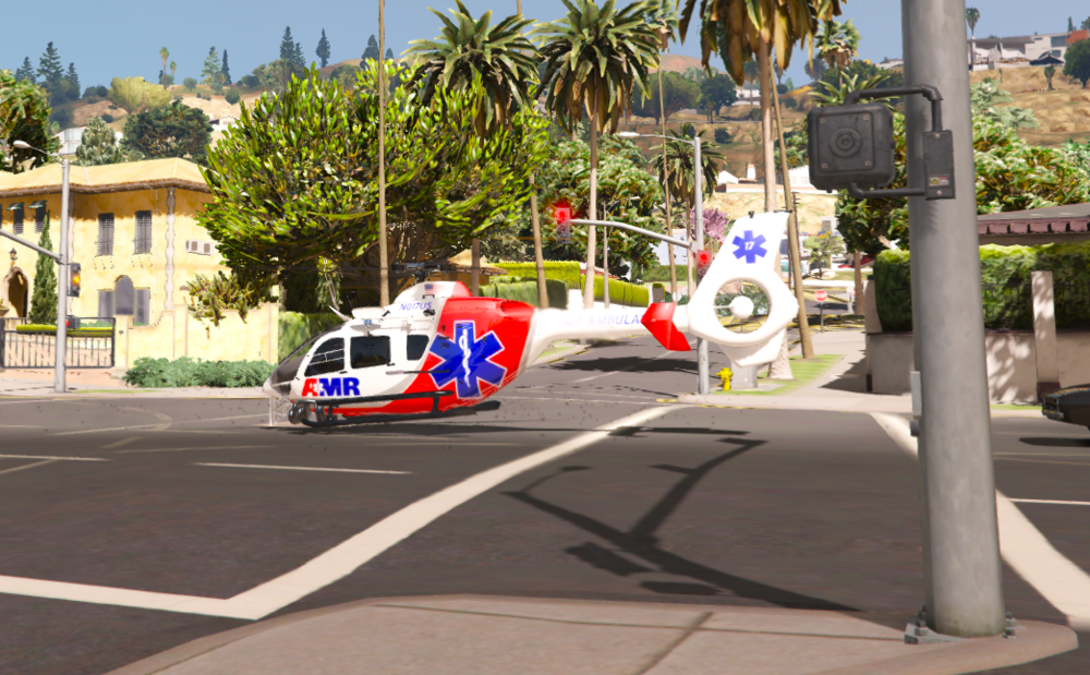 Could contain: outdoor, vehicle, road, car, tree, land vehicle, wheel, palm tree, street, palm